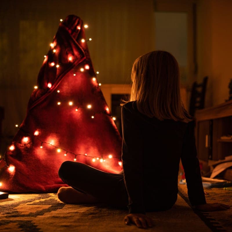 Battery-powered lights wound through greenery